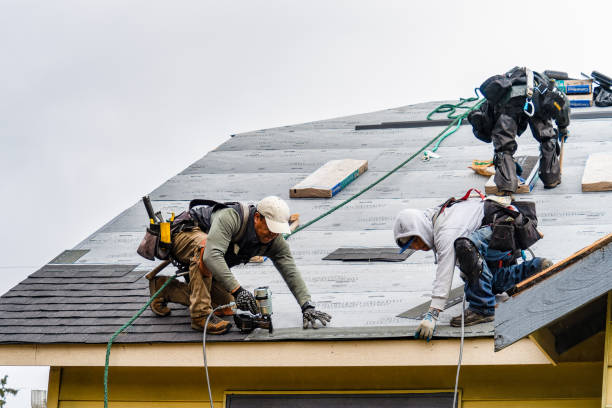 Professional Gutter Installation technician working in Roseburg, OR